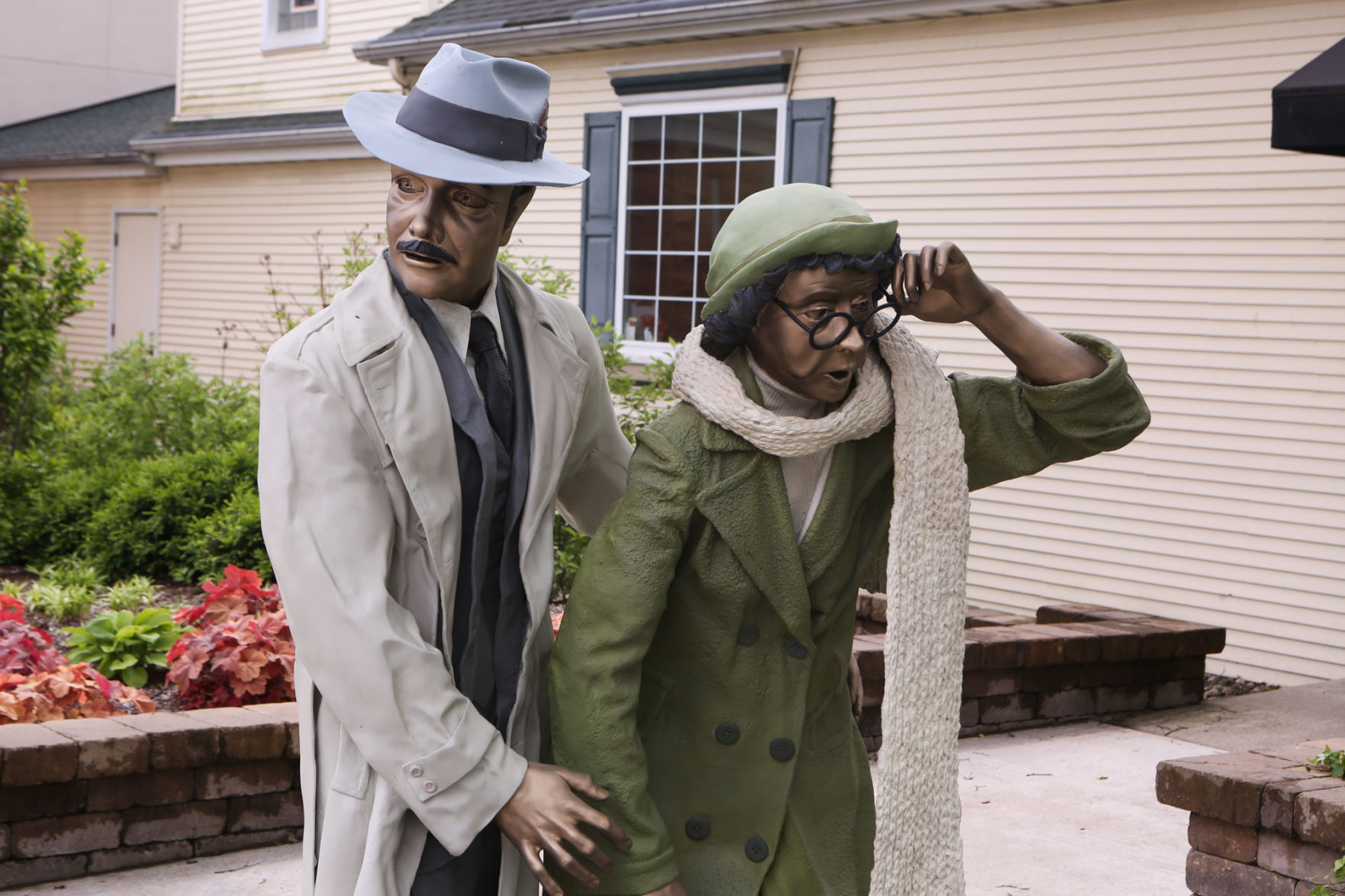 Artist Seward Johnson's "The Tooth" is implanted at the Crown Point Sportsplex